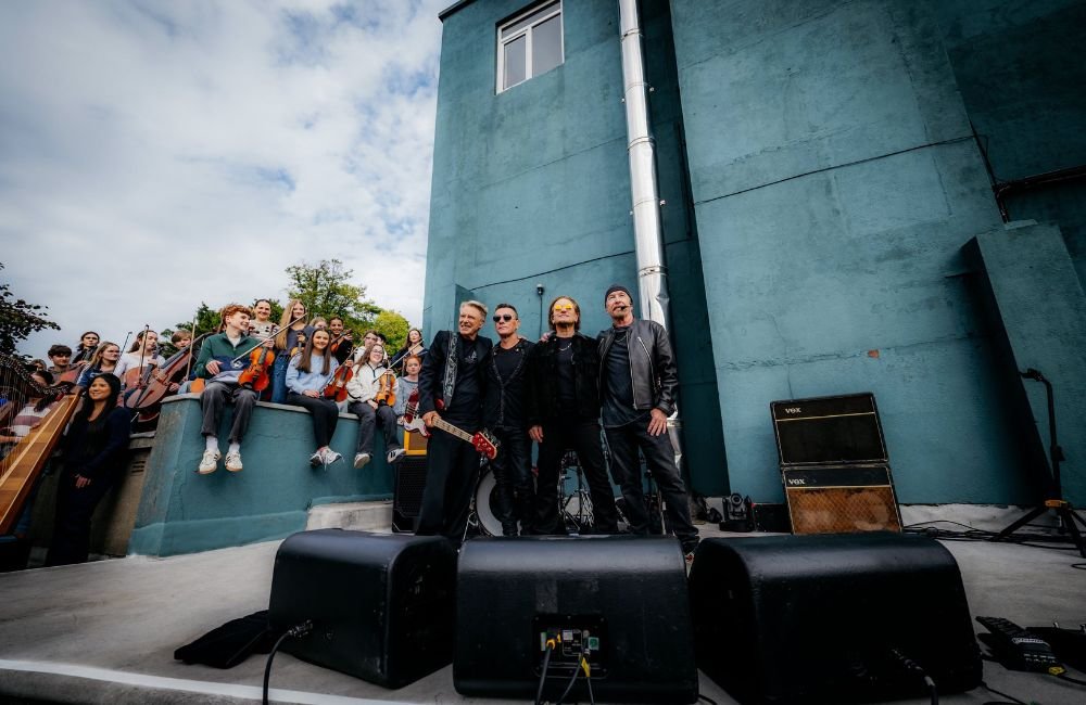 U2 At Their Dublin School On 50th Anniversary Of Their Formation